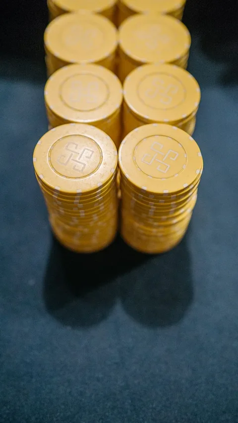 Golden casino gaming chips stack
