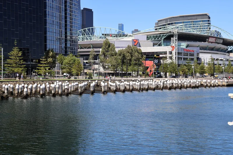 A sunny view of Marvel Stadium and the waterfront at Docklands, Melbourne, Australia.