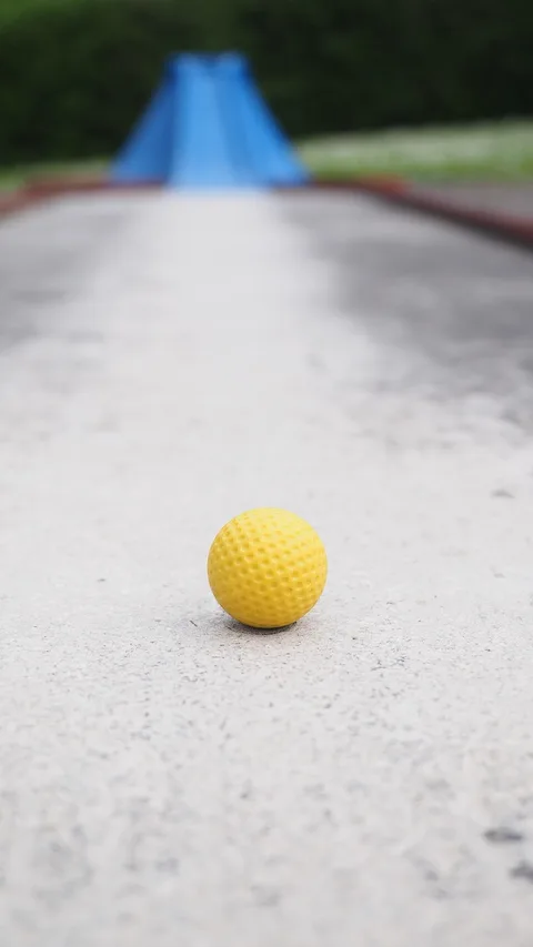 Chrome ball rolling down track