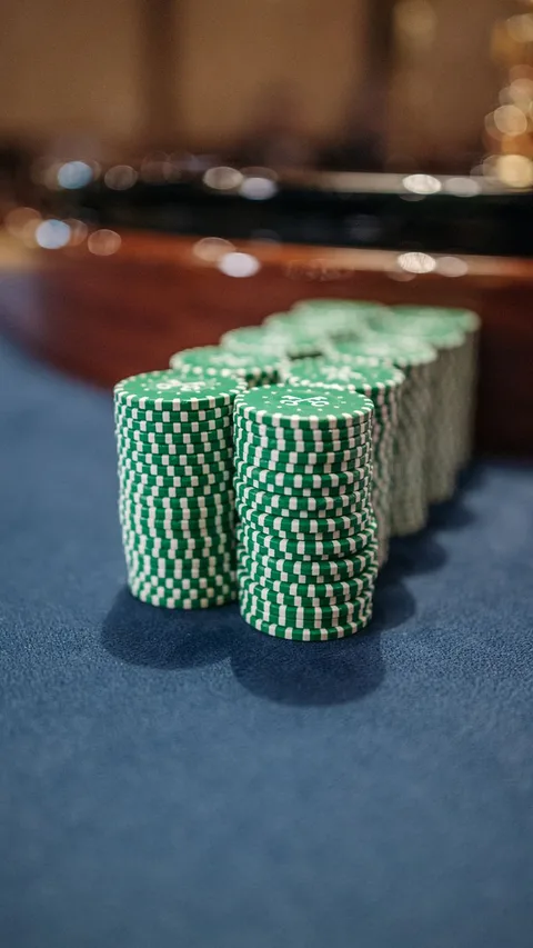Stack of green poker chips
