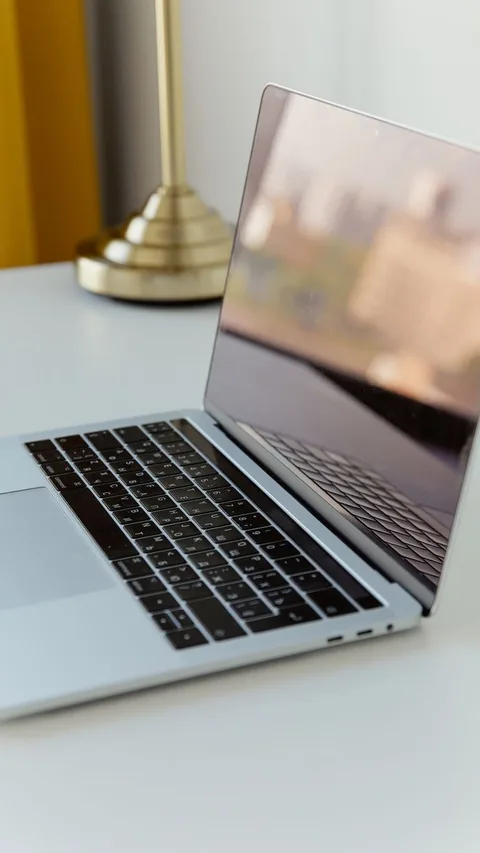 Brass padlock on laptop keyboard