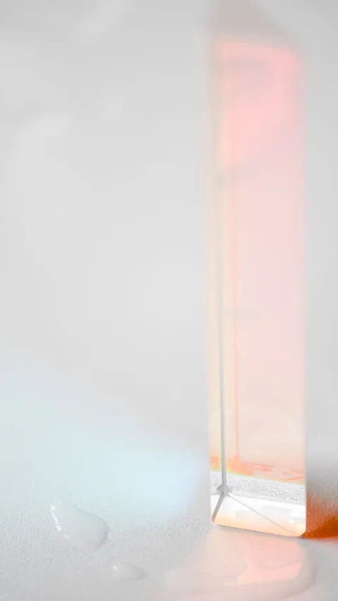 Glass prism splitting light beam