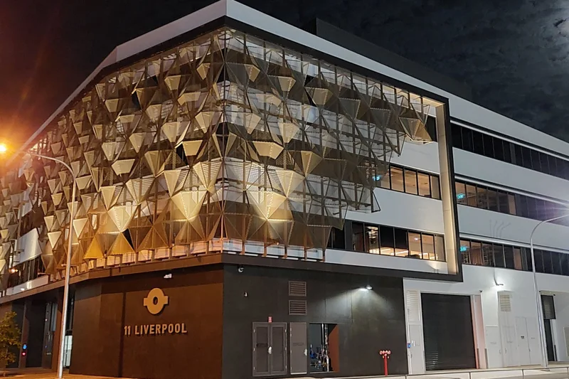 The Australian Taxation Office building in Townsville, photographed at night from across the street