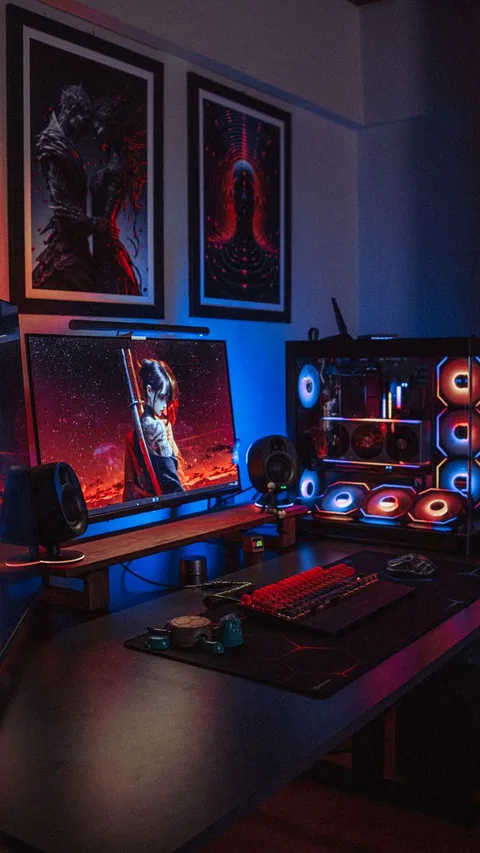 Modern backlit computer setup in dark